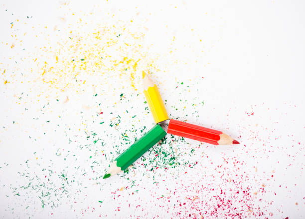 istock Three small pencil red green yellow white background 1056065414