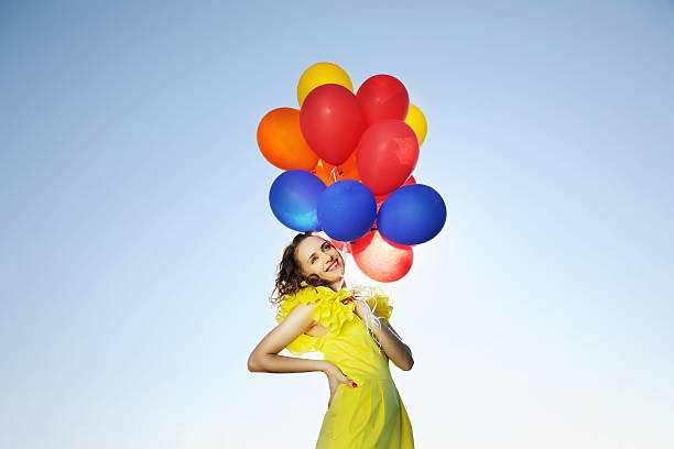 istock Woman with balloons 105606680