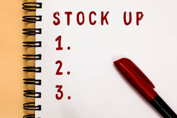 istock Handwriting text writing Stock Up. Concept meaning buy large amount something so that you will have enough for future Marker over open spiral notebook white page communicating ideas messages. 1056072076