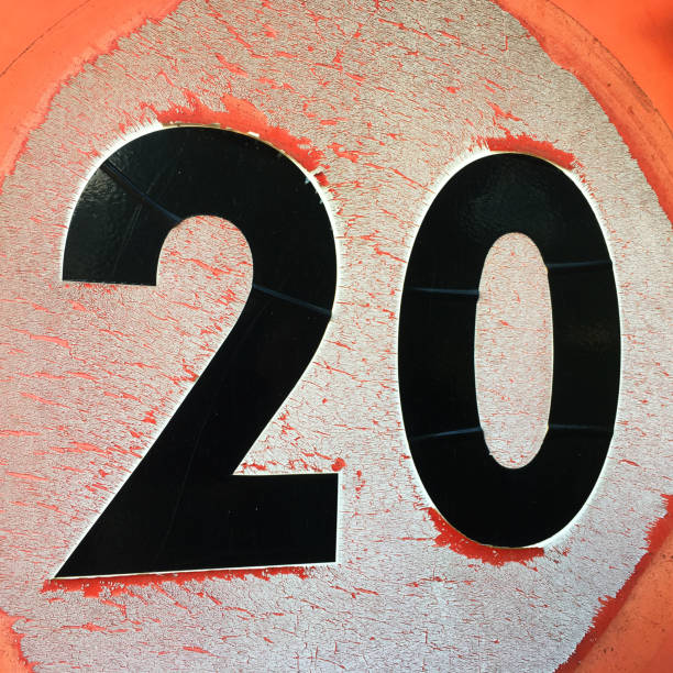 istock Old weathered twenty kilometres per hour sign in Spain 1056076464