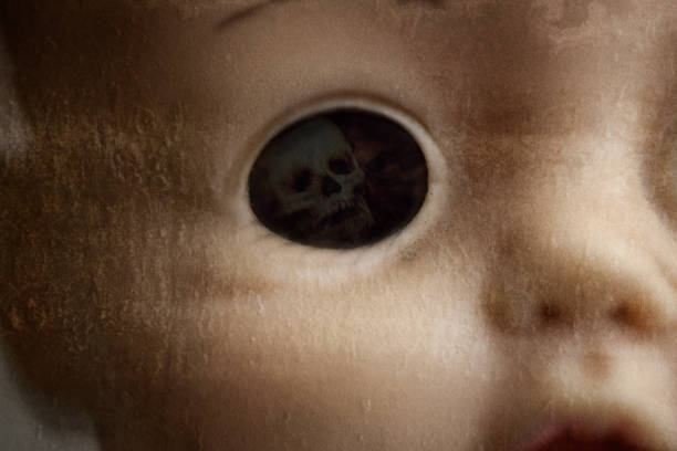 istock Creepy Doll Face Closeup 1056082722