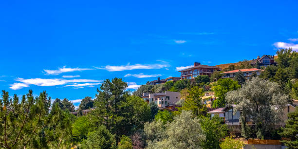 istock Homes on hill under blue sky in Salt Lake City 1056087184