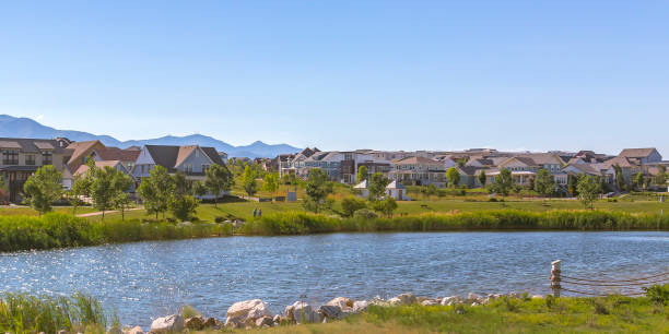 istock Lake homes and mountain in Daybreak Utah 1056087192