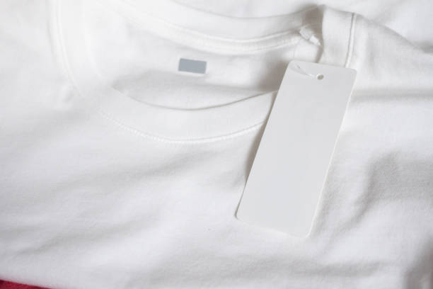 istock Blank price tag label on white t-shirt 1056088454