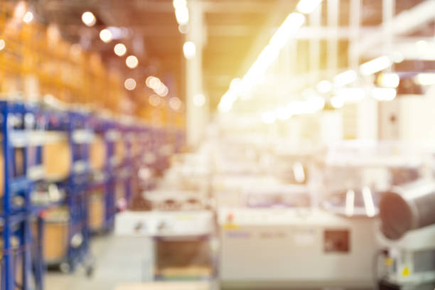 istock Abstract defocused background, blurred factory and equipment, for industry theme 1056088596