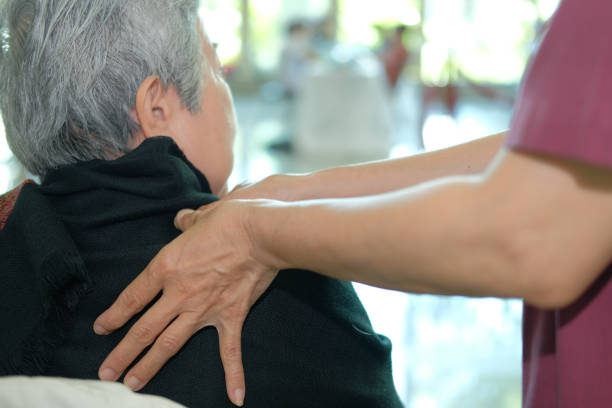 istock physiotherapist massage old woman shoulder 1056088852