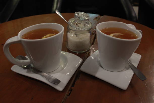istock double glass of lemon tea 1056096206