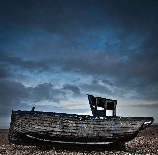 istock abandoned Fishing Boat 1056096238