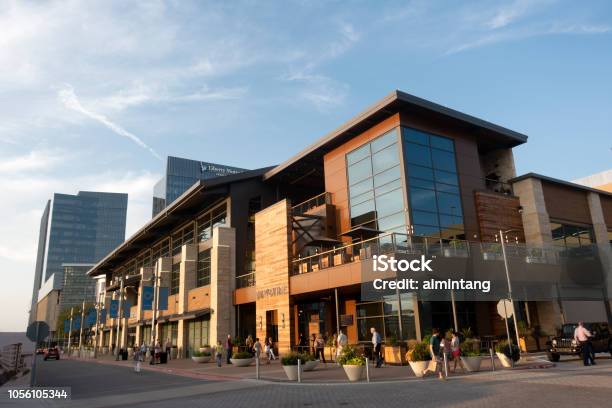 People Walking On Sidewalk At Legacy West Development In Plano Stock Photo - Download Image Now