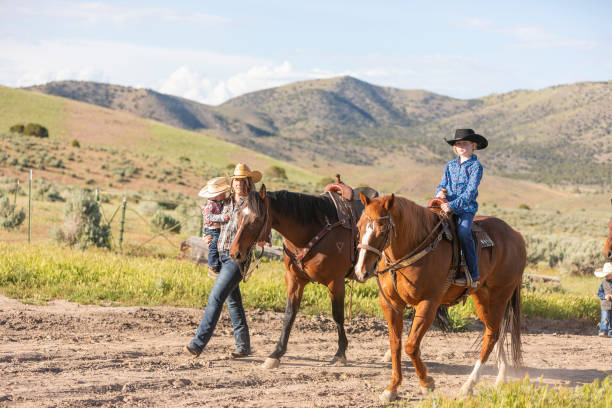 istock Farming Family With Horses 1056108926