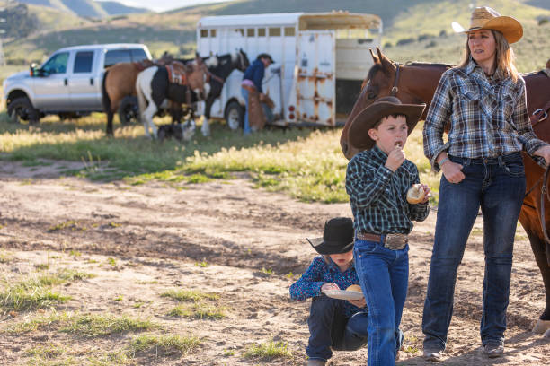 istock Farming Family With Horses 1056108934