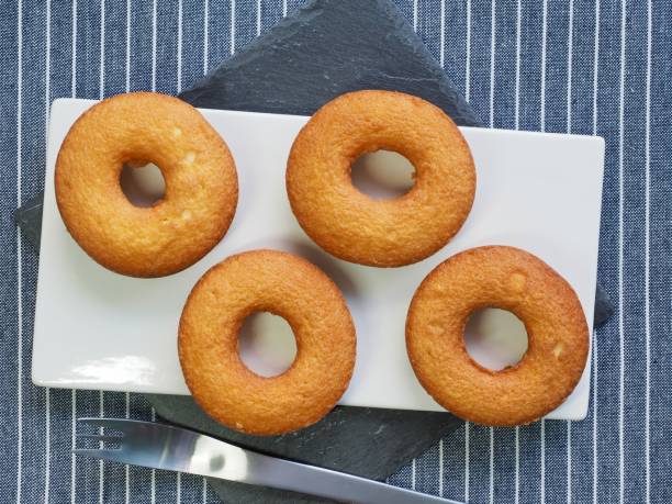 Brown donuts and forks OLYMPUS DIGITAL CAMERA round sugar cookie stock pictures, royalty-free photos & images