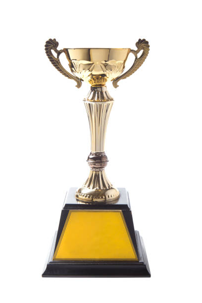 istock Golden trophy isolated on white background. Winning awards 1056137498