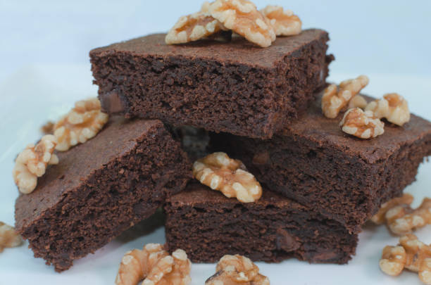 istock Homemade chocolate brownie pieces on white plate 1056137970