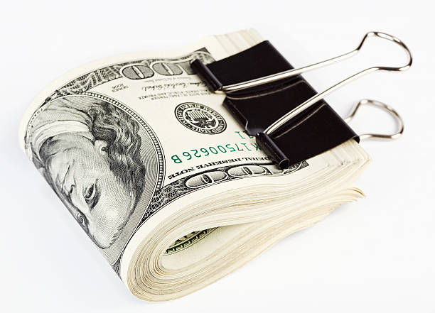 istock US dollars Bundle fasten with paper clip 105614474