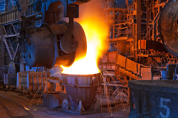 istock Pouring liquid metal at iron works 105614765