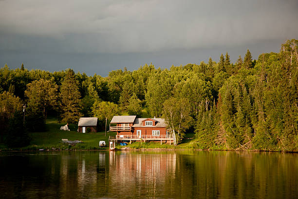 istock Cabin on the lake at sunset 105614959