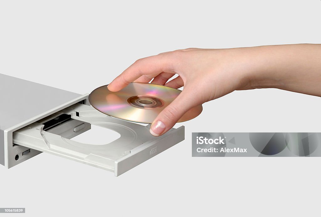 Kompaktowy dysk CD i ręczne wprowadzanie - Zbiór zdjęć royalty-free (Biznes)