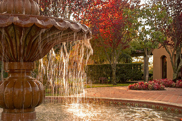 fountain fountain,pond,and courtyard in background fountain courtyard villa italian culture stock pictures, royalty-free photos & images