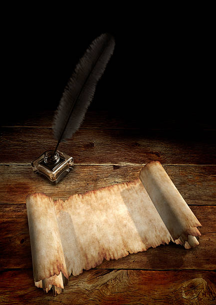 istock Vintage feather pen in holder with a paper scroll 105616723
