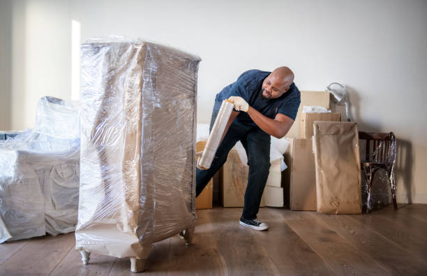 istock Black man moving furniture 1056168114