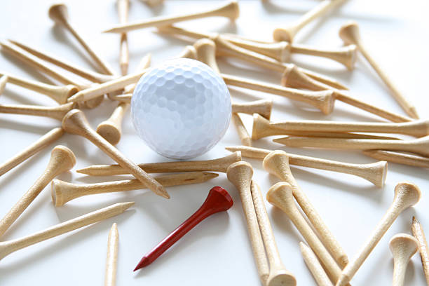 Golf ball and tees stock photo