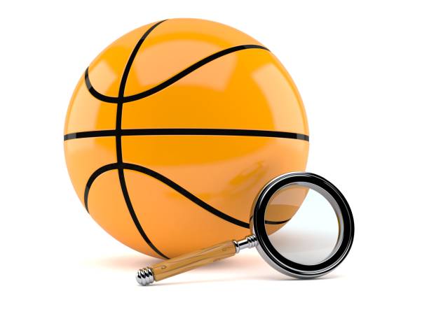 istock Basketball ball with magnifying glass 1056174268