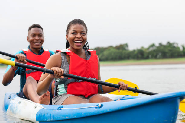 istock Couple canoeing in a lake 1056192884