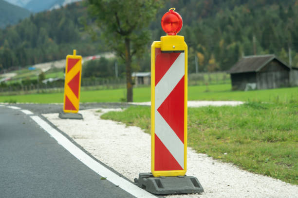 istock A construction road warning sign on the roadside 1056195596