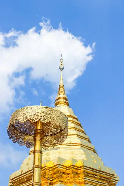 Photo of Golden pagoda and umbrella in Wat Phra That Doi Suthep is the popular tourist destination of Chiang Mai, Thailand.