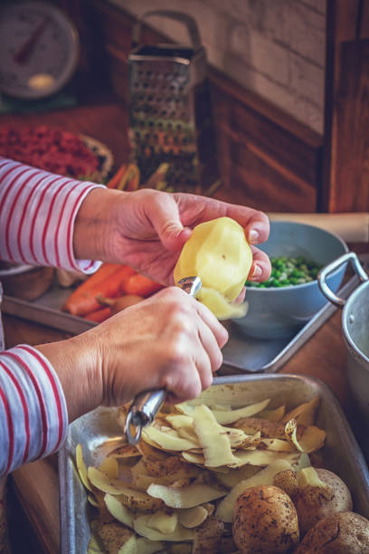 istock Preparing Traditional Shepard`s Pie in Domestic Kitchen 1056203150