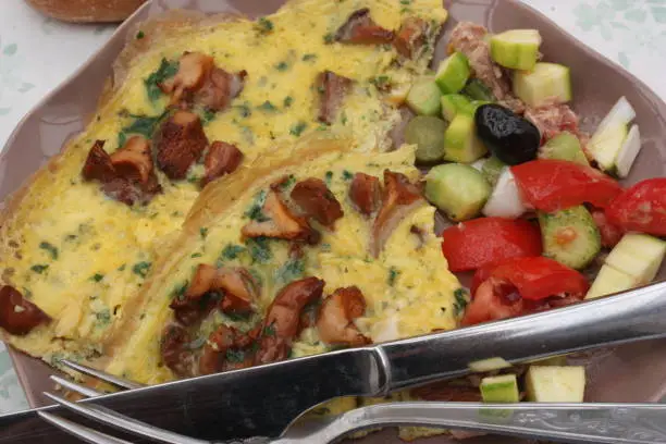 Photo of Omelette with chanterelles and Rawness  French baguette