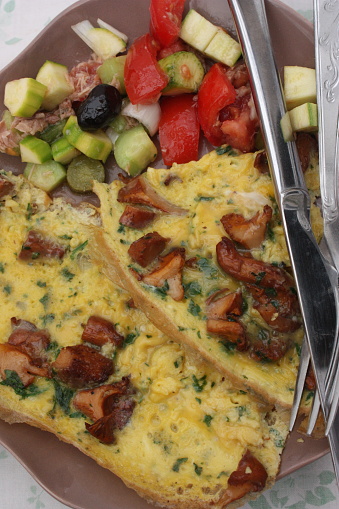 Omelette with chanterelles and Rawness  French baguette