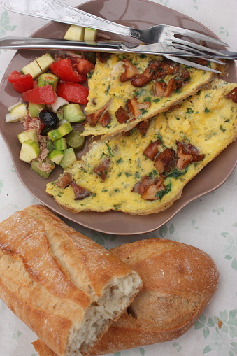 Omelette with chanterelles and Rawness  French baguette
