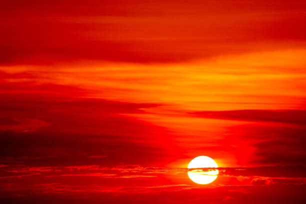 istock last light sunset on  sky orange cloud ray around sun 1056206584