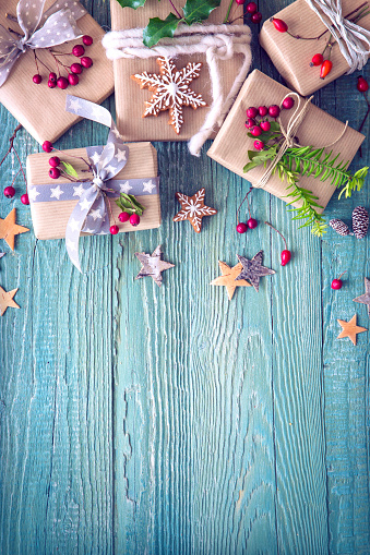 Christmas vintage gifts on a wooden background