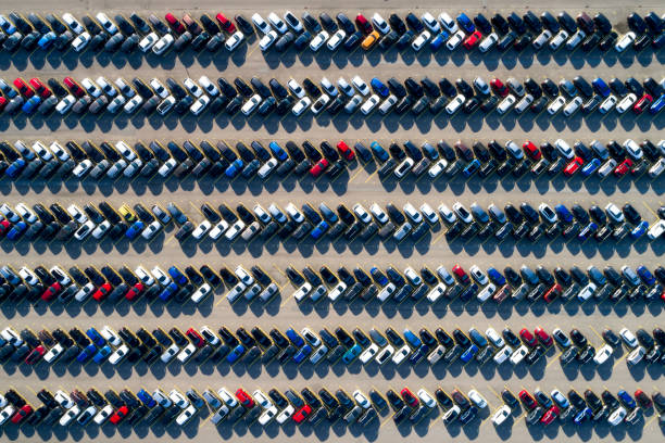 Aerial View of Rows of Cars Aerial view of new cars of different brands parked in rows on a lot. engine photos stock pictures, royalty-free photos & images