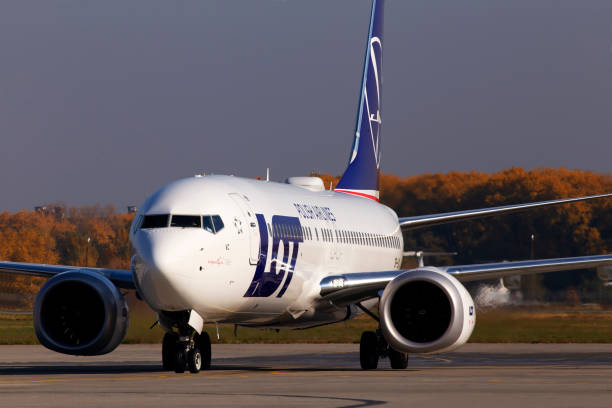 SP-LVC LOT - Polish Airlines Boeing 737 MAX 8 aircraft running on the runway of Borispol International Airport stock photo