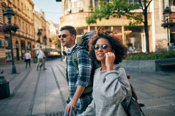 Young Backpackers In The City