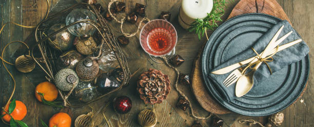 istock Christmas or New Year holiday table setting with candles 1056213188