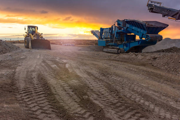 istock Quarry with machinery for the processing of the stone 1056213266