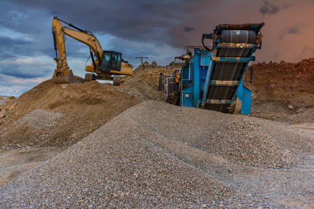 istock Quarry with machinery for the processing of the stone 1056213268