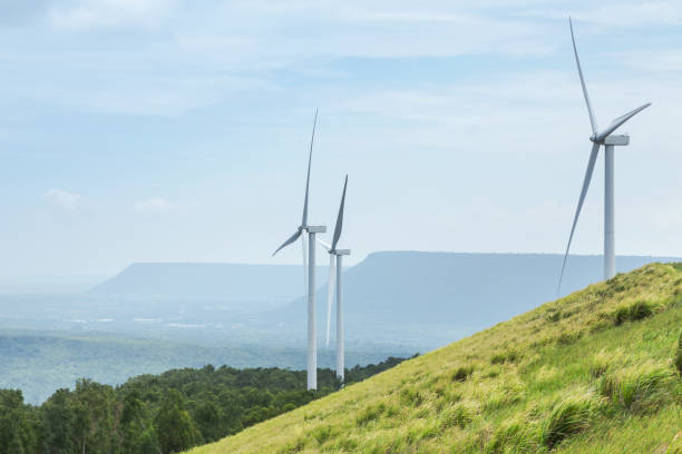 white wind turbwind turbines generating electricity in wind power station White wind turbines generating electricity in wind power station at Lam Takhong reservoir dam, Nakhon Ratchasima, Thailand under blue sky Korat stock pictures, royalty-free photos & images