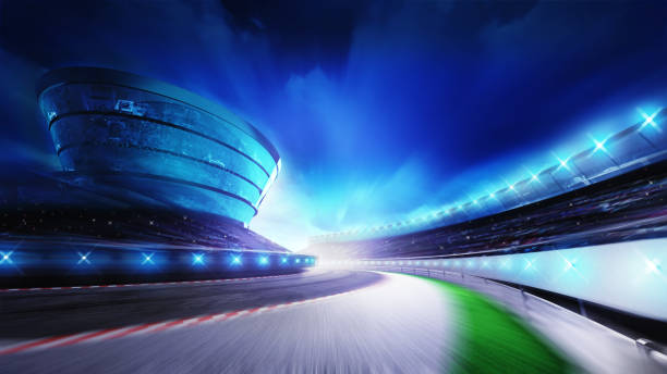 istock race track bended road with stands and spotlights 1056218704