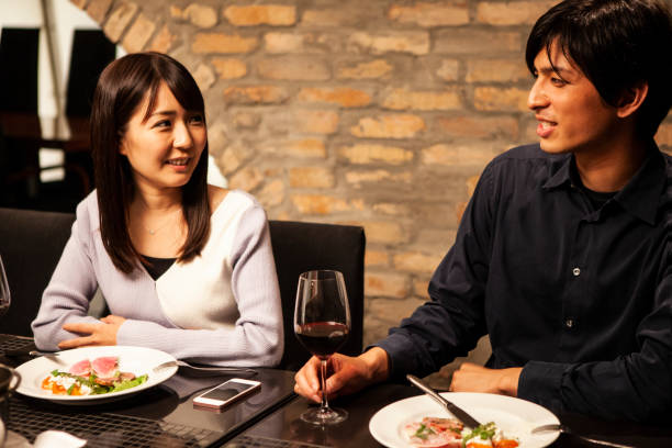 istock Eating dinner in italian restaurant 1056220124