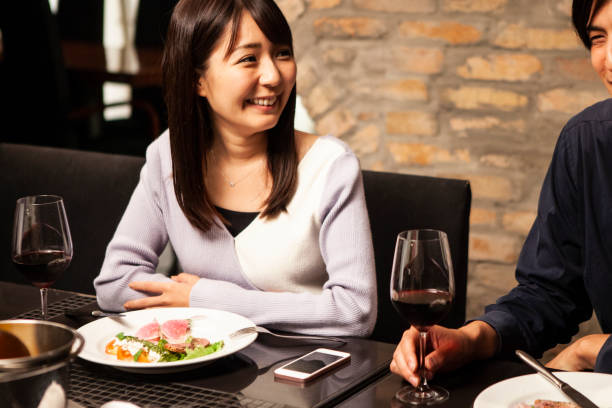 istock Eating dinner in italian restaurant 1056220138