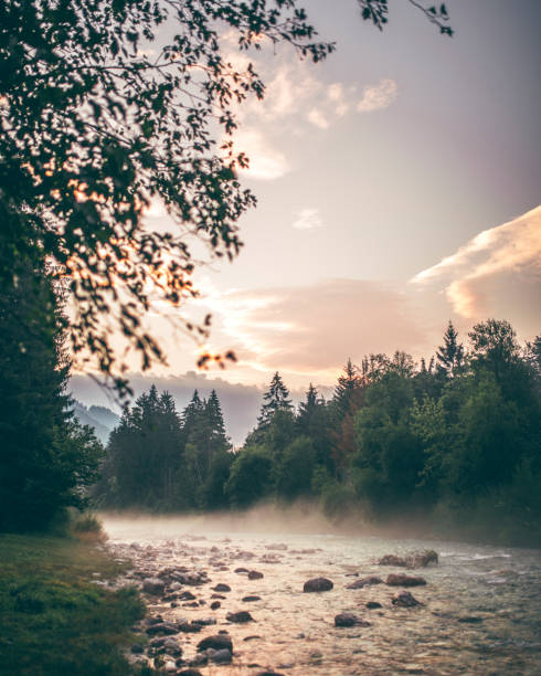 istock Beautiful river on a misty morning 1056220484