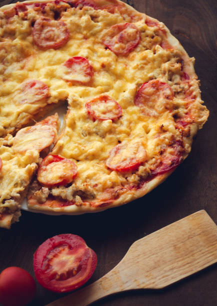 istock Homemade spicy pizza with chicken and tomato. 1056227120