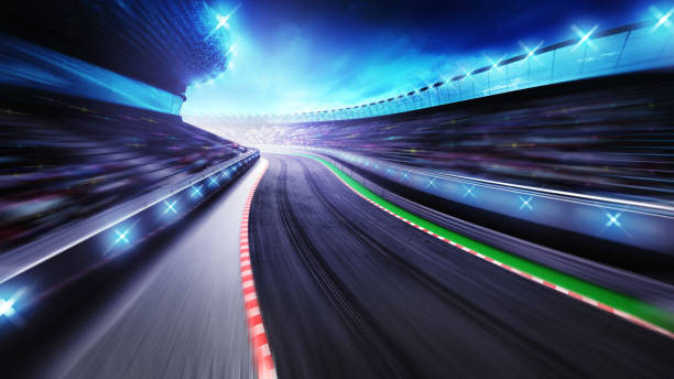istock bended asphalt racetrack with stands around 1056228916