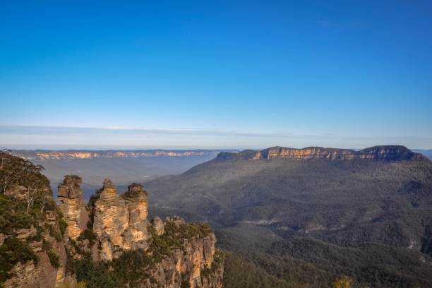 istock Three sister rock formation and an Eucalyptus valley, Australia 1056229544